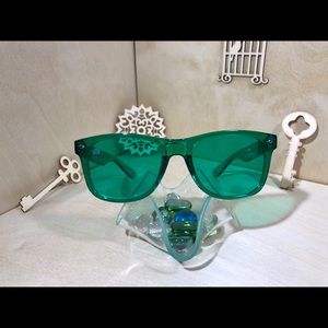Rainbow Optx Accessories - Green lenses and translucent framed sunglasses Rainbow Optx Accessories - Green lenses and translucent framed sunglasses